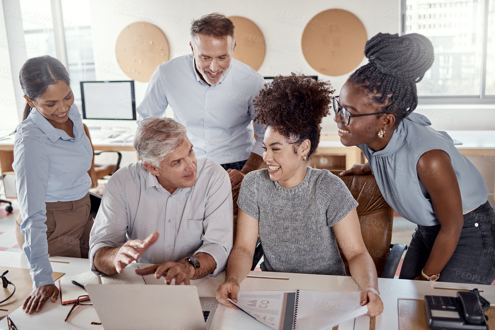 Buy stock photo Shot of a group of businesspeople having a meeting in a modern office