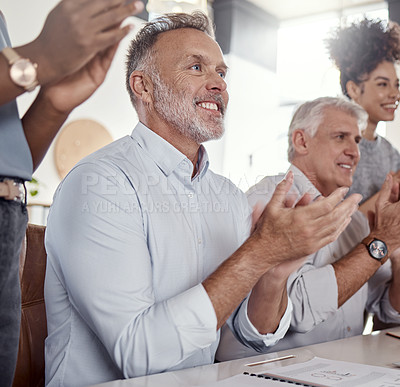 Buy stock photo Shot of a group of businesspeople clapping during a conference in a modern office