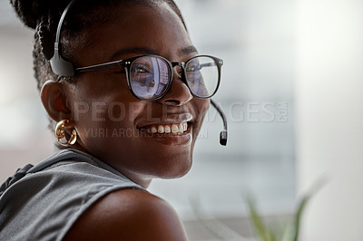 Buy stock photo Shot of a young woman using a headset in a modern office