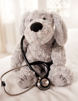 Buy stock photo Still life shot of a stuffed animal and a stethoscope
