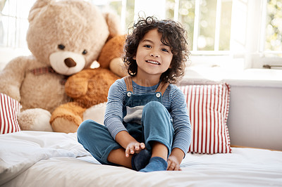 Buy stock photo Portrait of an adorable young boy relaxing in his bedroom at home