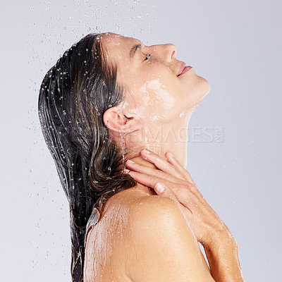 Buy stock photo Woman, water drops and washing or facial in studio, clean and shower for cosmetic or hygiene. Female person, skincare and grooming on white background, beauty and refreshing liquid for routine pamper