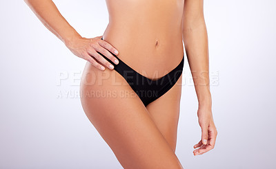 Buy stock photo Body, underwear and woman in studio for stomach, gut healthcare and wellness for abs. Model girl, lingerie and diet or weight loss with results and transformation by white background with confidence