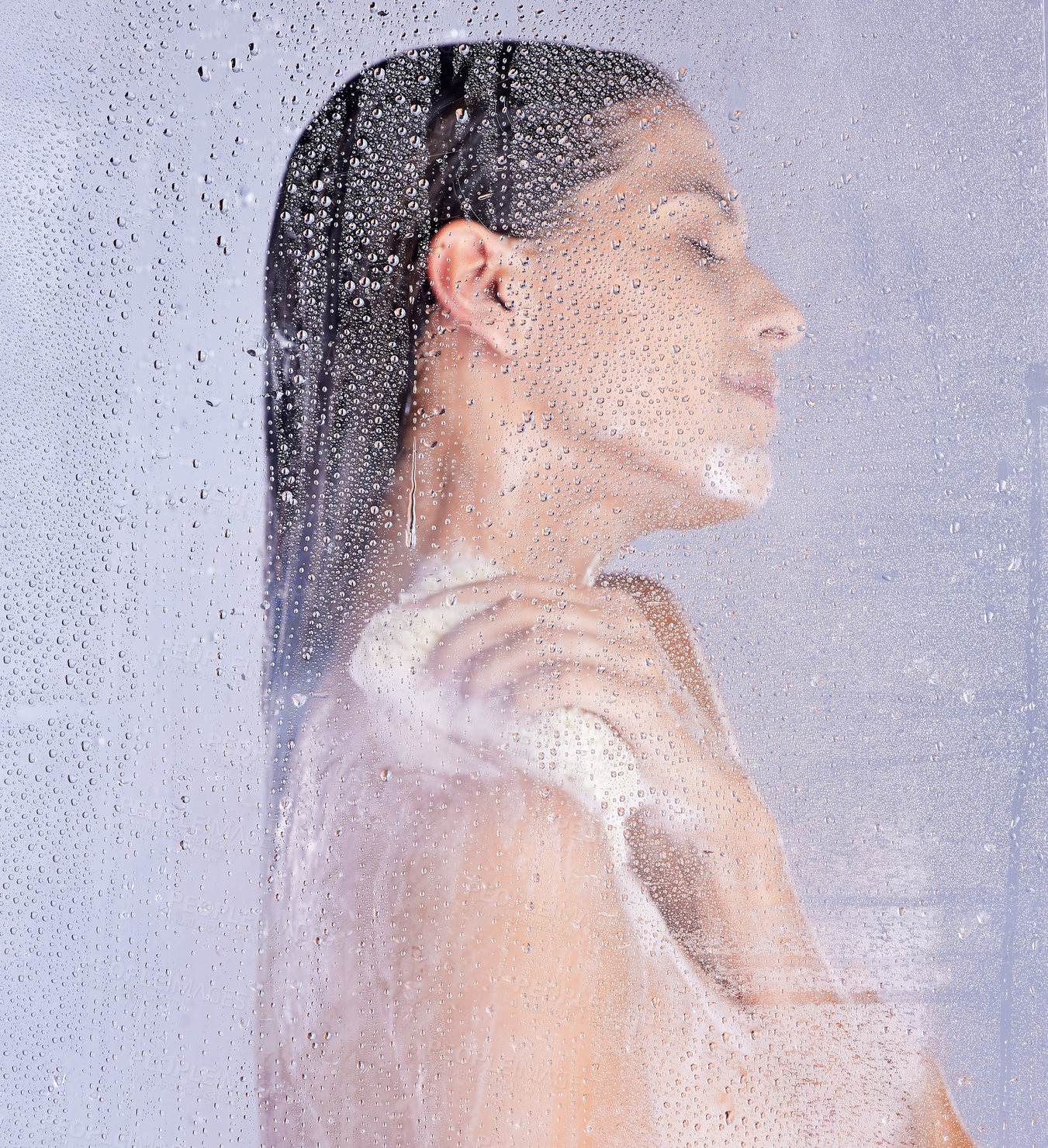 Buy stock photo Shower, washing and hand of woman with puff in studio for hygiene, treatment or morning routine on white background. Body care, glass and model with eyes closed for grooming, water drops or wellness