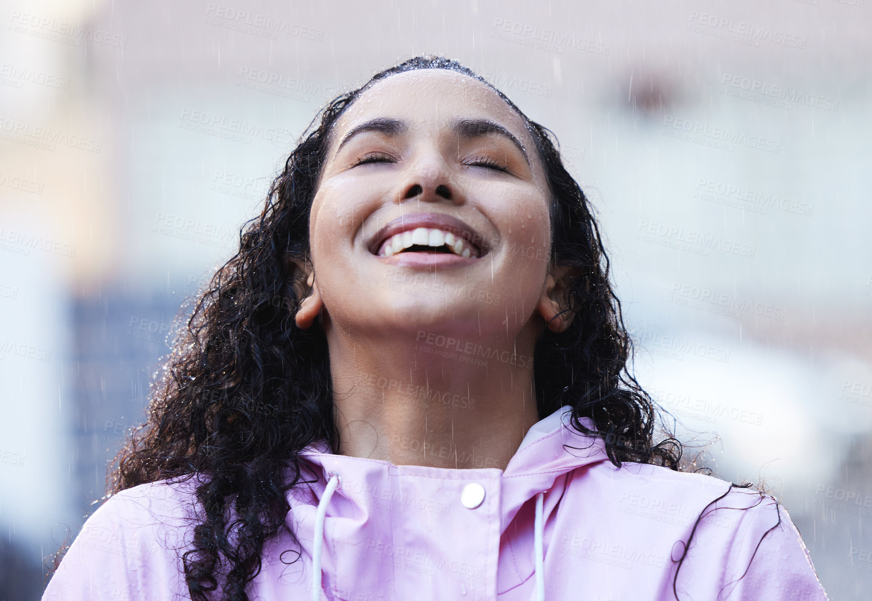 Buy stock photo Happy woman, rain and winter in city with gratitude, freedom and wellness in storm. Female person, water splash and smile for travel or commute on sidewalk with mindfulness and meditation in New York