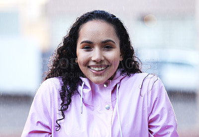 Buy stock photo Happy woman, rain and portrait in city with gratitude, wellness and winter or storm. Female person, water splash and smile for travel or commute on sidewalk with weather and urban in New York