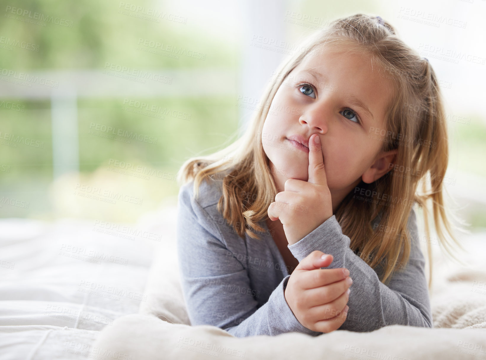 Buy stock photo Thinking, child and young girl in bedroom for relax, holiday and dream for weekend in home. Kid, happy and idea on vacation in countryside for development, fun and hands for resting and fantasy