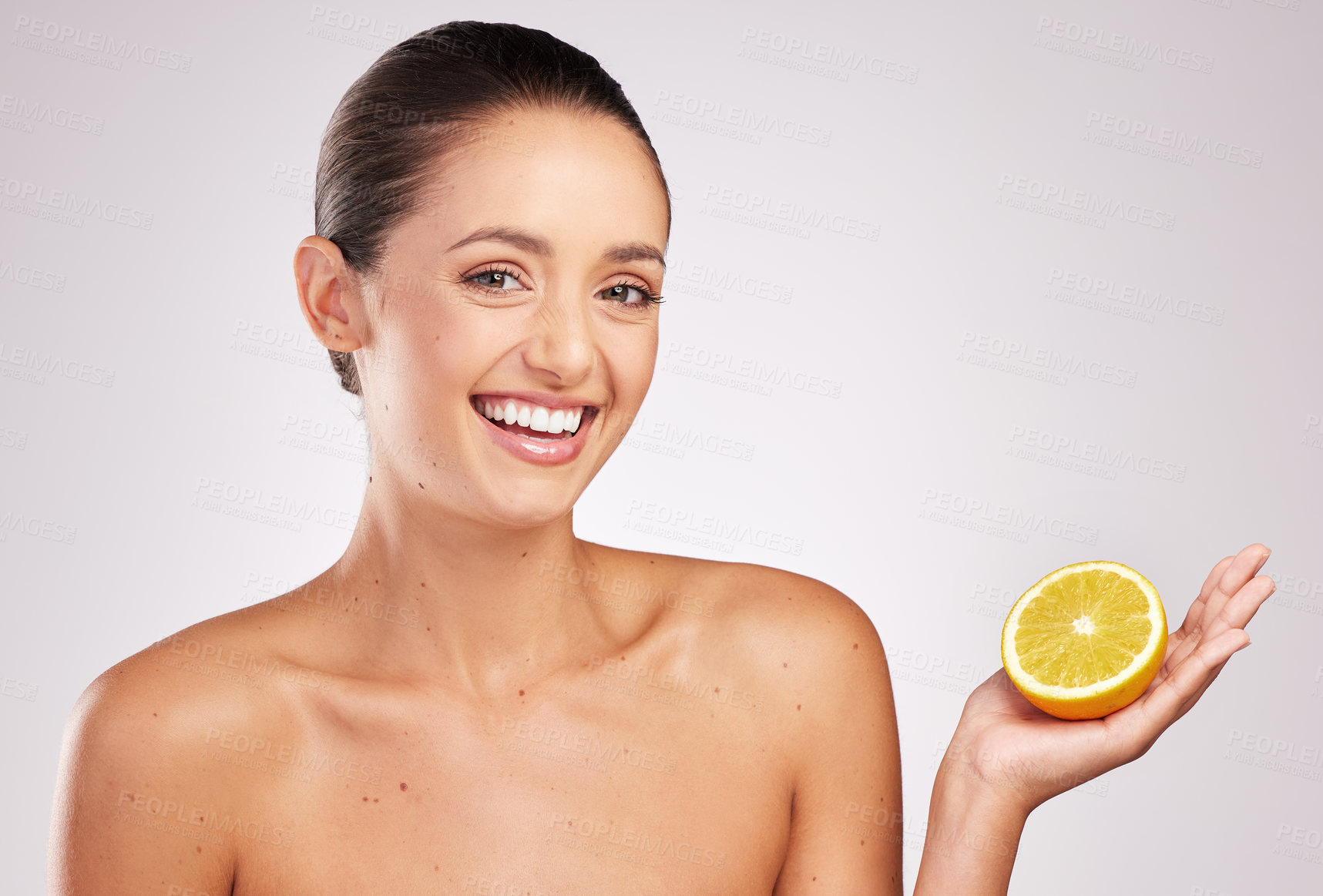 Buy stock photo Orange, skincare and hand of woman with portrait in studio for organic facial, treatment or natural cosmetics on white background. Spa, citrus fruit and model for vitamin C, dermatology or wellness