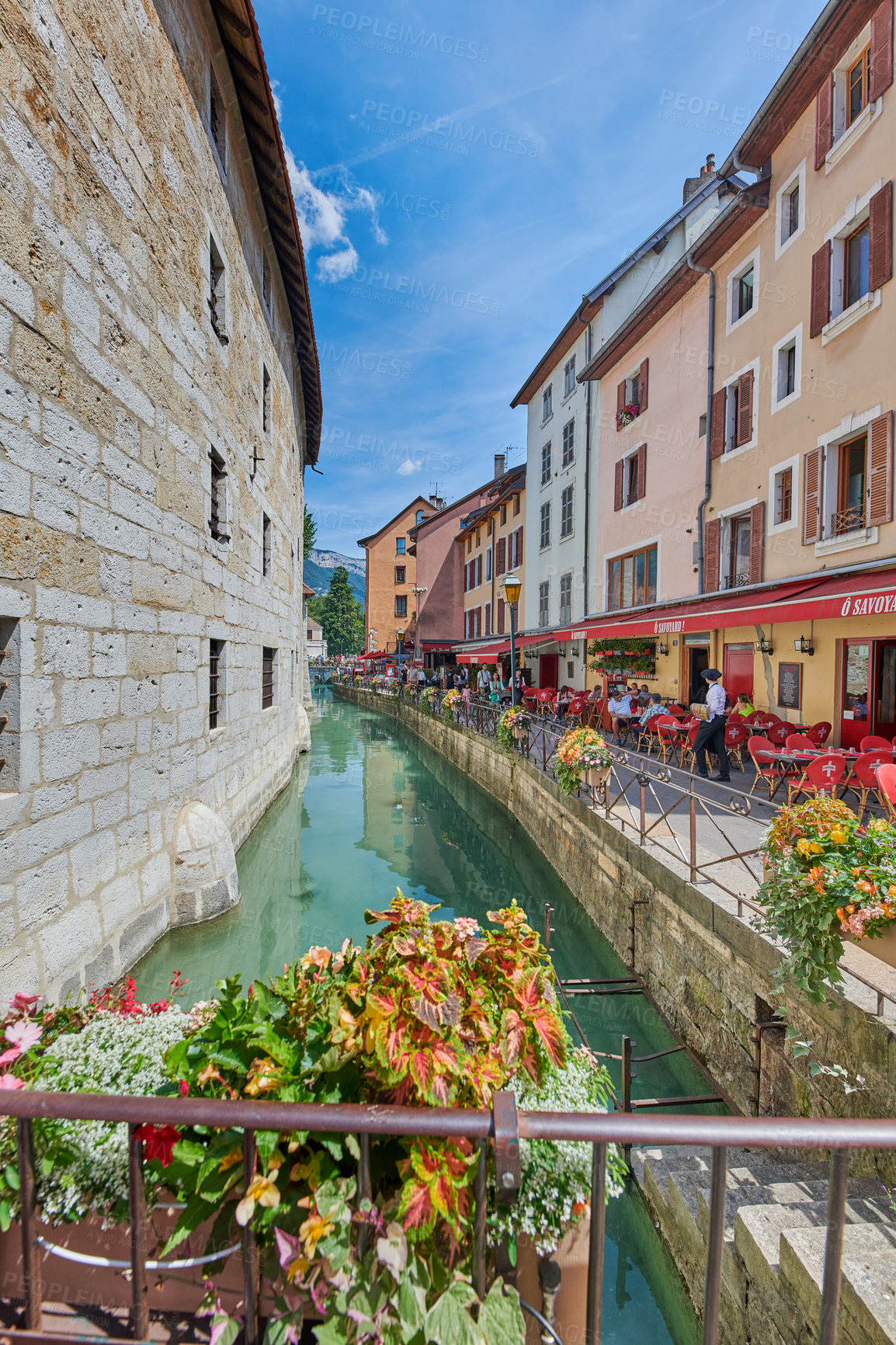 Buy stock photo Annecy, France, July, 17, 2019: Houses and street life in the famous medieval part of the city of Annecy, Department of Upper Savoy, France.Editorial: Annecy, France, July, 17, 2019: Houses and street life in the famous medieval part of the city of Annecy, Department of Upper Savoy, France.