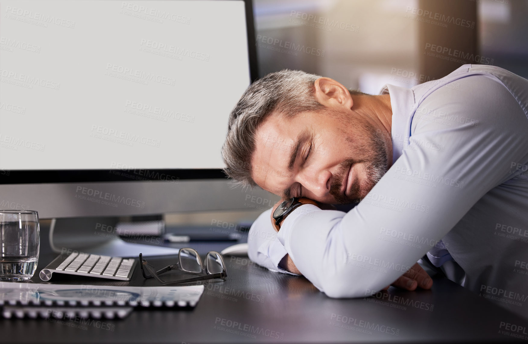 Buy stock photo Mature man, sleeping and tired in office with computer,  desk and exhausted as employee with deadline. Company, business and fatigue from administration work or overtime in pc as project manager