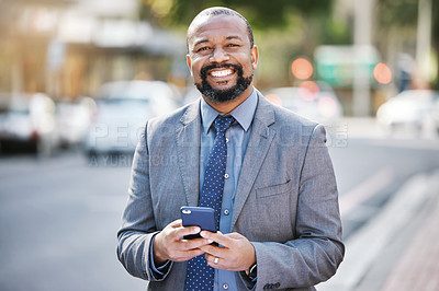Buy stock photo Business, portrait and black man with phone in city for social media, networking and consultant outdoor in Kenya. Mobile, happy professional and face of entrepreneur, worker and employee in street
