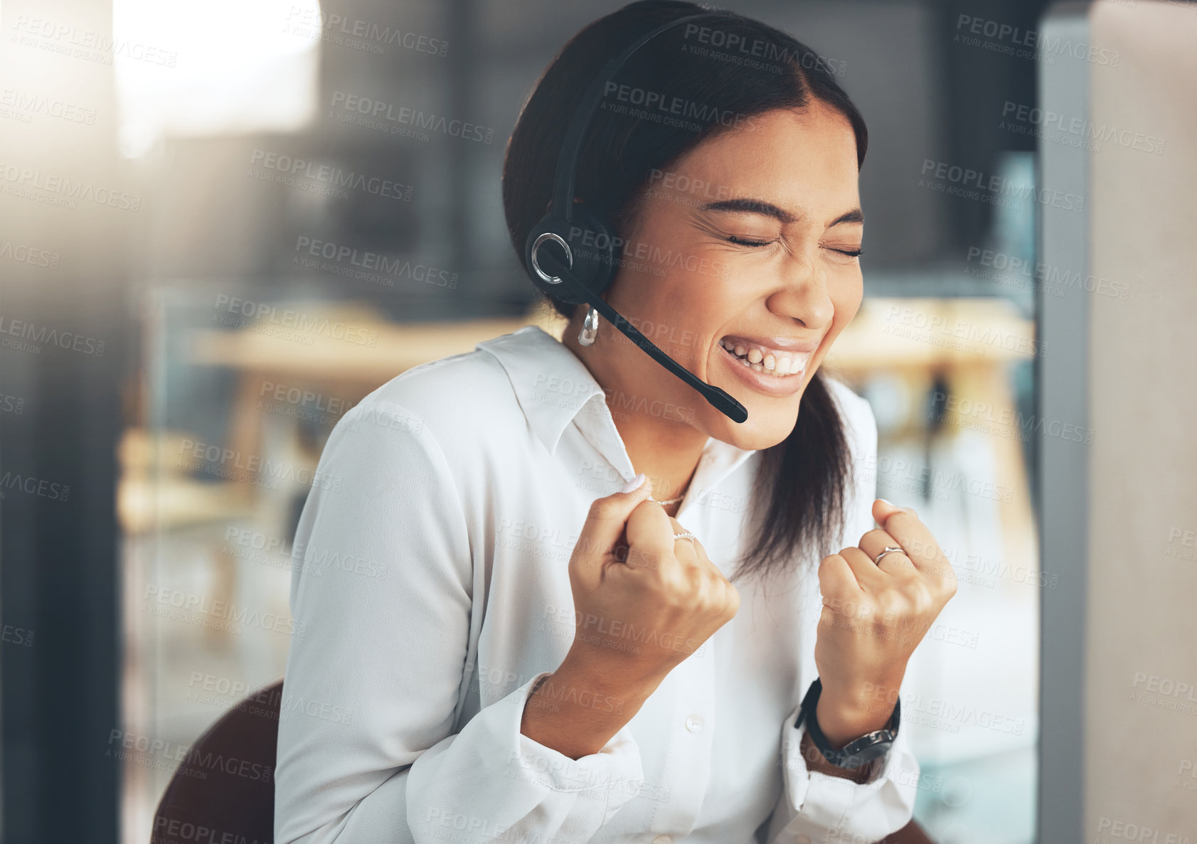 Buy stock photo Call center, customer service and celebration with a woman consultant in her office for support or assistance. CRM, contact us and cheering with a female employee consulting using a headset at work