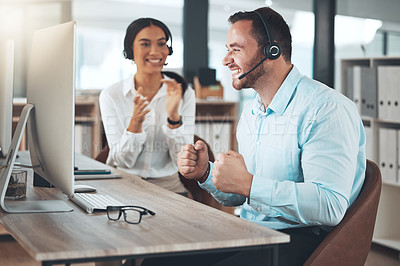 Buy stock photo Celebration, call center and man with colleague in office for success, achievement or sales target. Happy, lens flare and telemarketing agent with headset for winning, consulting goal or CRM support