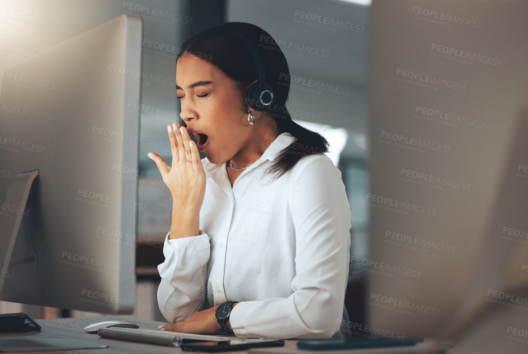 Buy stock photo Woman, call centre and yawn at night, burnout and secretary or assistant tired in office. Female person, sleepy and receptionist or fatigue and overworked, exhausted and operator for consulting