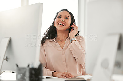 Buy stock photo Shot of a young female call center agent in an office at work