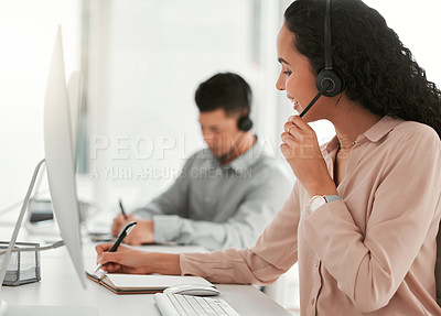 Buy stock photo Call center, computer and woman writing notes in office for telemarketing online consultation. Communication, customer service and female technical support consultant working on desktop in workplace.