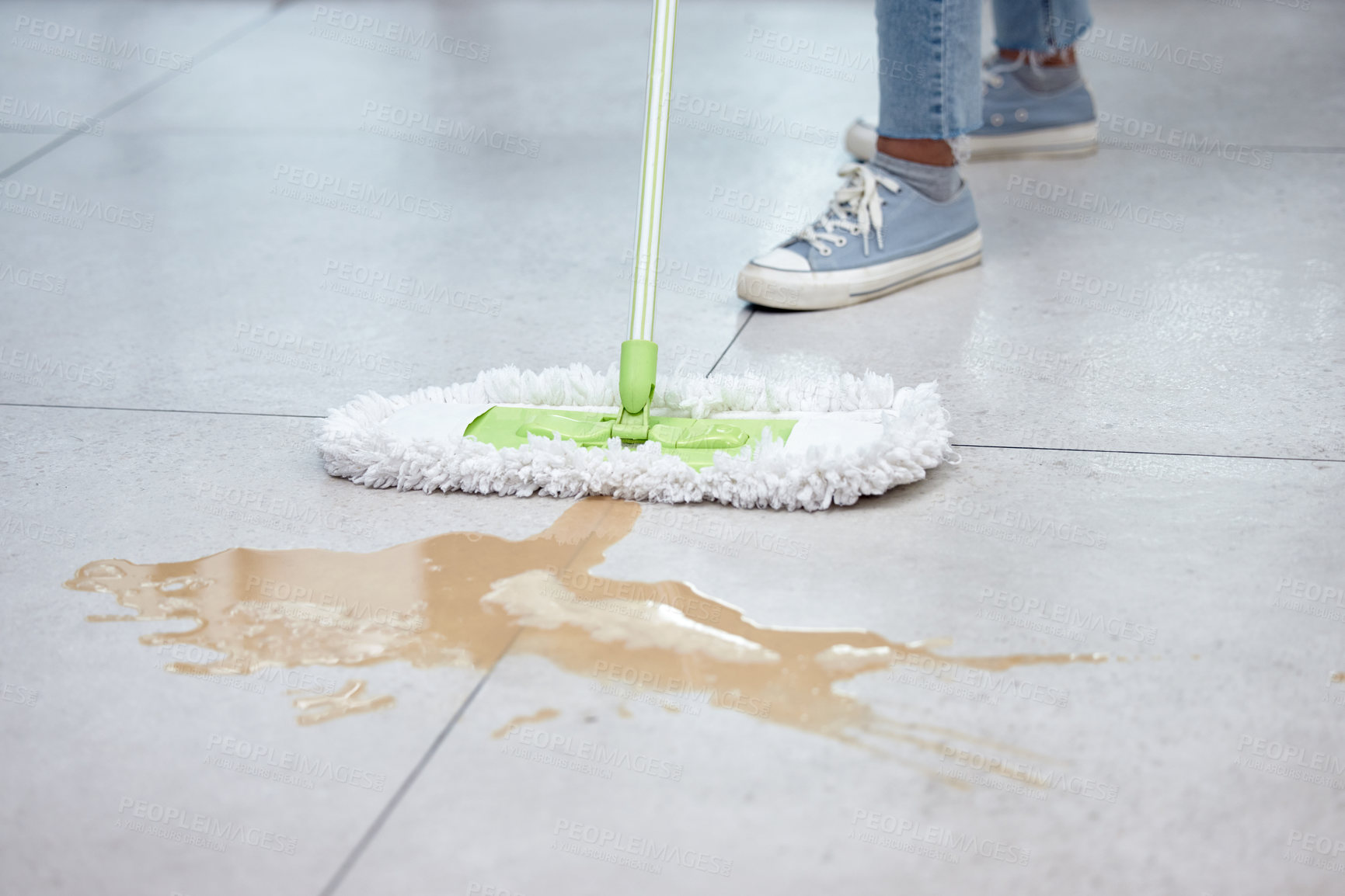 Buy stock photo Shot of a woman mopping her floor