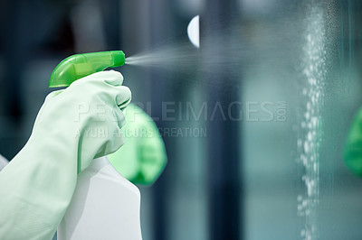 Buy stock photo Shot of a woman cleaning her windows