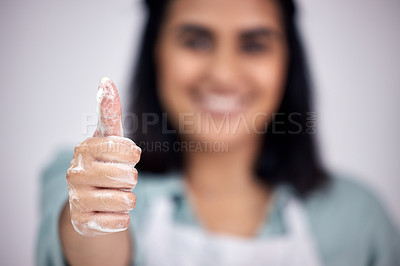 Buy stock photo Shot of a young woman giving the thumbs up with freshly washed hands