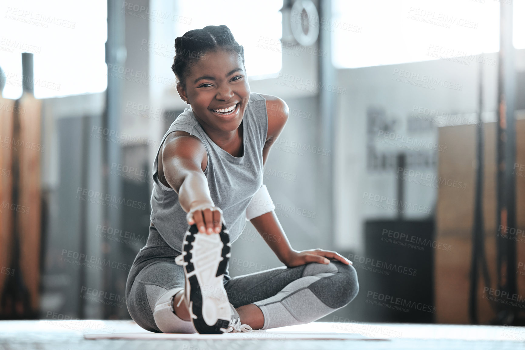 Buy stock photo Gym, happy or portrait of black woman stretching legs for workout or body movement for active fitness. Smile, athlete or healthy girl smiling in exercise training warm up for flexibility or mobility