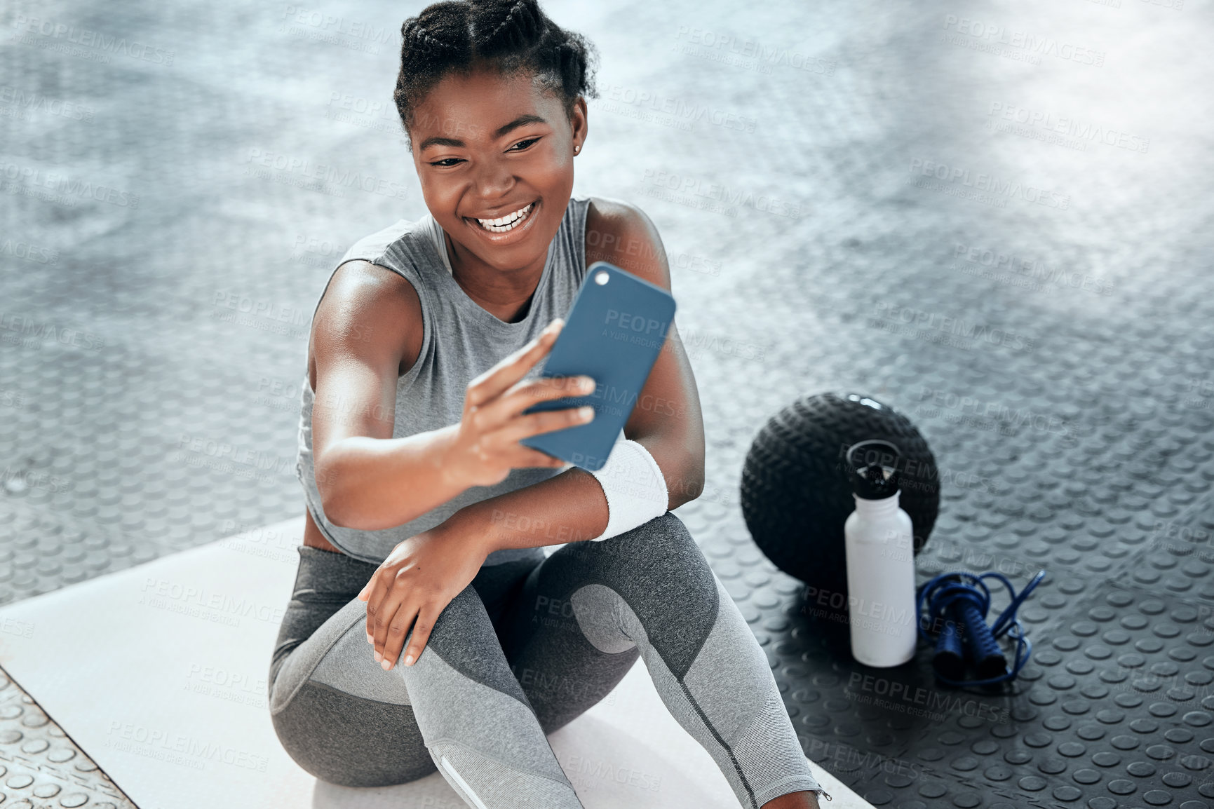 Buy stock photo African woman, gym selfie and floor for fitness, workout or wellness with smile for social media app. Influencer girl, photography or blog for exercise, performance and health for lifestyle in club