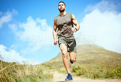 Buy stock photo Man, fitness and running on mountain for exercise, cardio workout or training in the nature outdoors. Male person, athlete or runner in sports outdoor run, hiking or trekking for healthy wellness