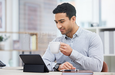 Buy stock photo Coffee, desk and businessman with tablet in office for research, communication and networking. Asian man, thinking and technology at work with internet for online report, update and corporate news