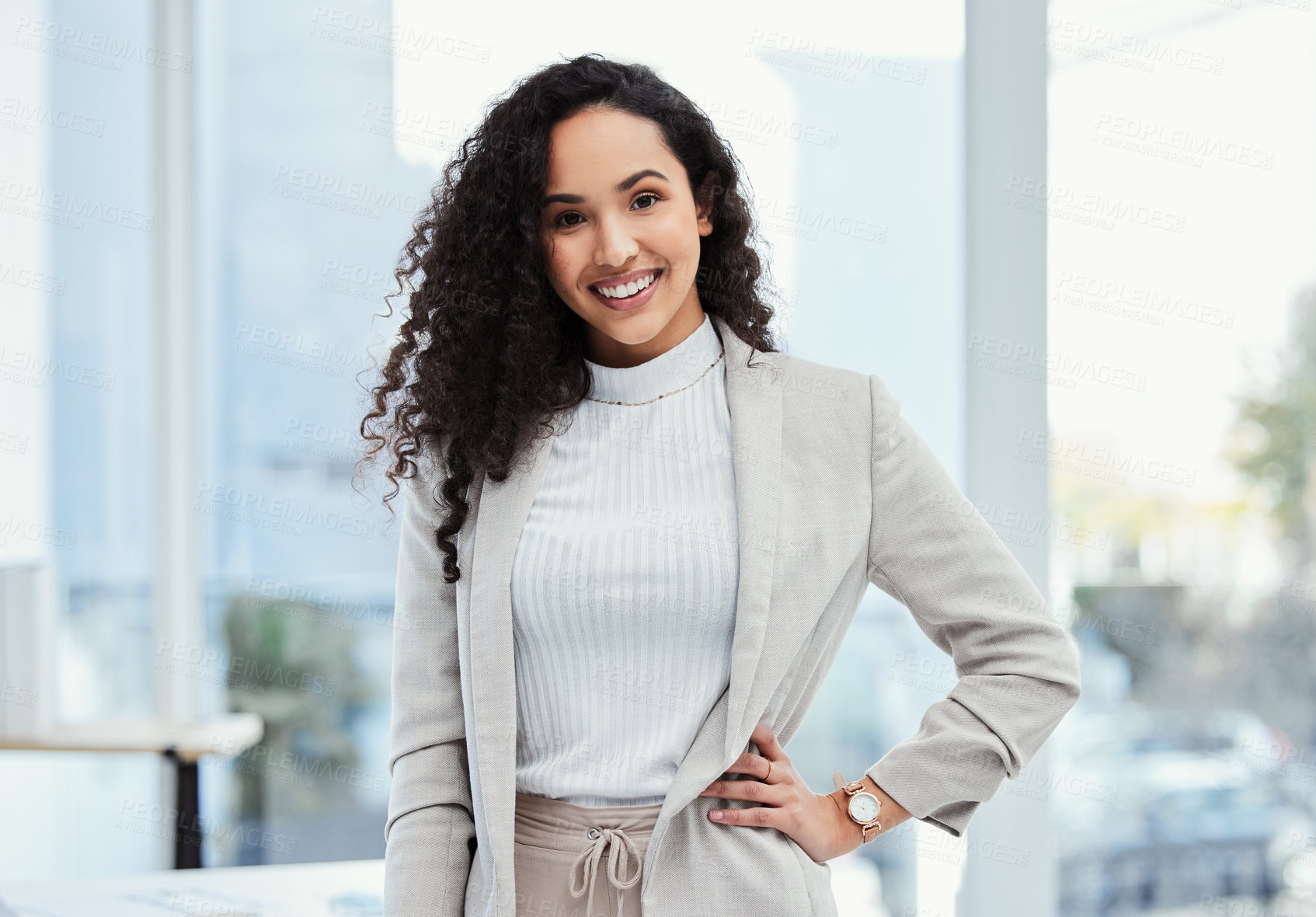 Buy stock photo Shot of a young businesswoman in her office