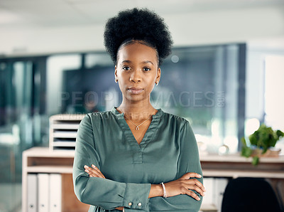 Buy stock photo Serious, crossed arms and portrait of a businesswoman in the office with vision, leadership or ideas. Professional, corporate and young African female hr manager standing with pride in the workplace.