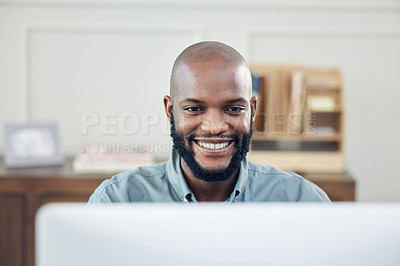 Buy stock photo Black man, smile and freelance at computer in home office for business, admin and copywriting at desk. African person, pleased and working in house or apartment for task, planning or networking at PC