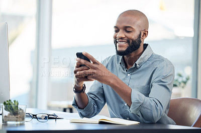 Buy stock photo Black man in office, check social media on smartphone and smile at meme, lunch break and communication. Male employee at workplace, using phone and technology, mobile app and contact with chat 