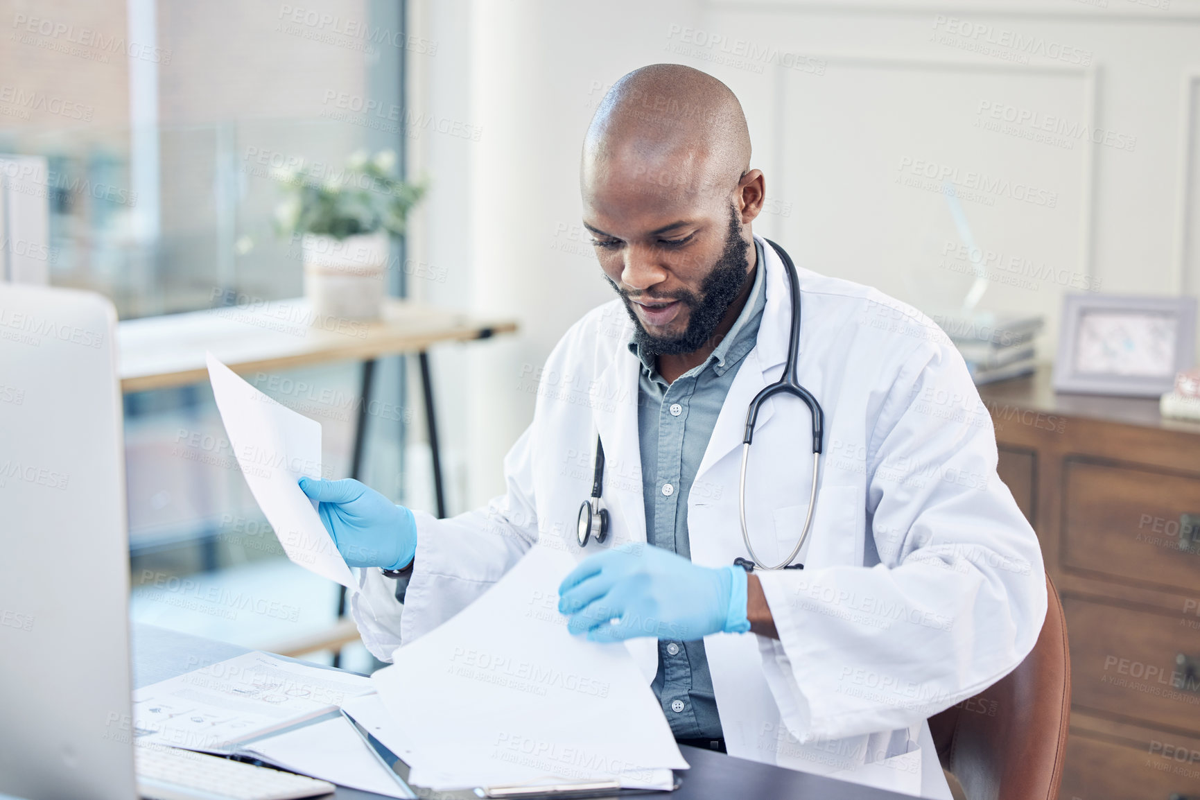 Buy stock photo Male doctor, desk and paperwork and research, medical case and documents for cure. Office, report and reading of papers for medicine insurance, file record or analysis of results or notes from clinic