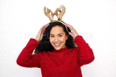 Buy stock photo Christmas, reindeer and portrait of woman with fashion on holiday or vacation in white background. Studio, model and girl with festive style of headband for merry xmas celebration with happiness