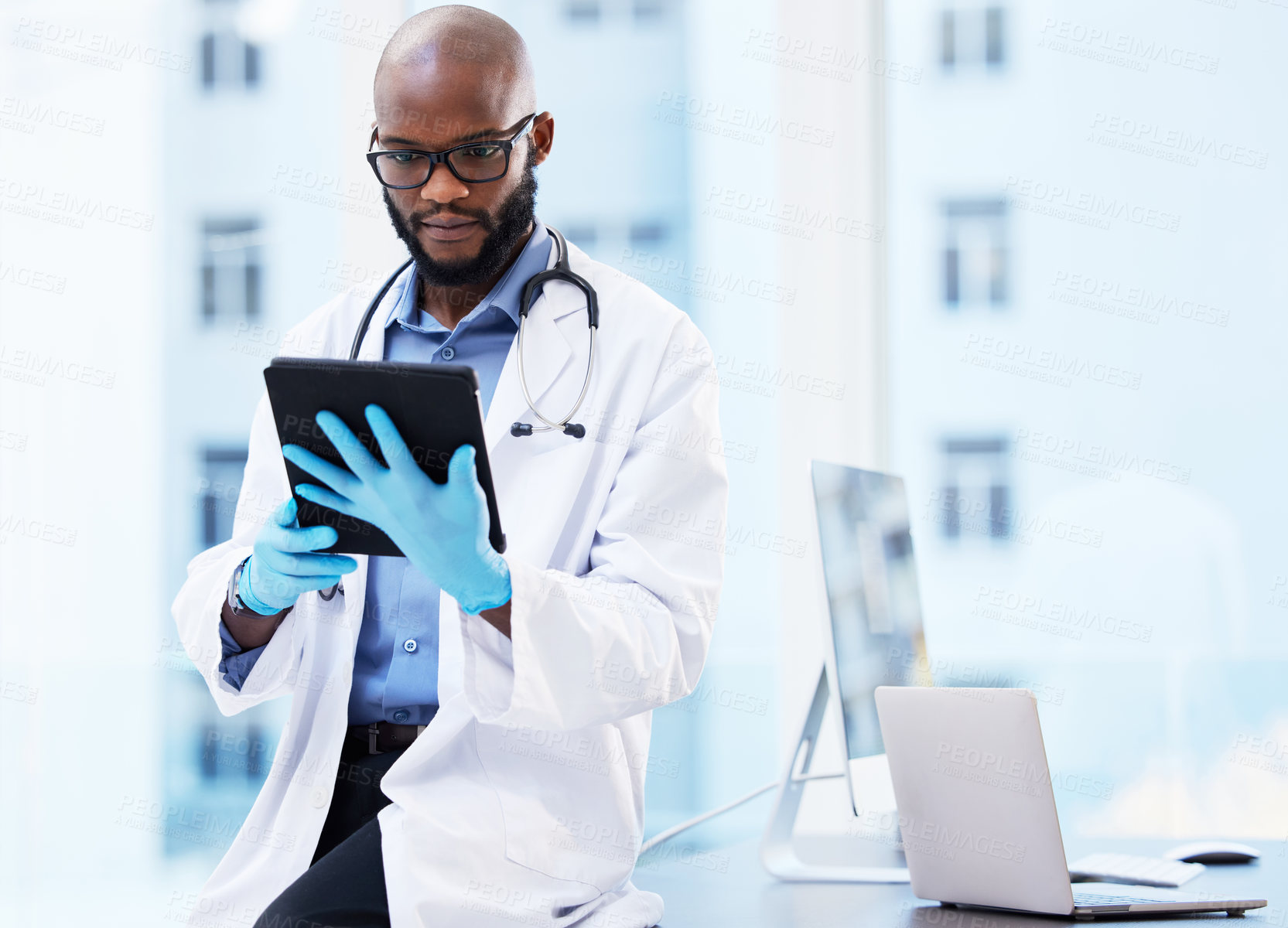 Buy stock photo Healthcare, tablet or black man doctor in office for research, planning or hospital faq. Help, stethoscope or cardiovascular surgeon with digital communication, consulting or Telehealth service app