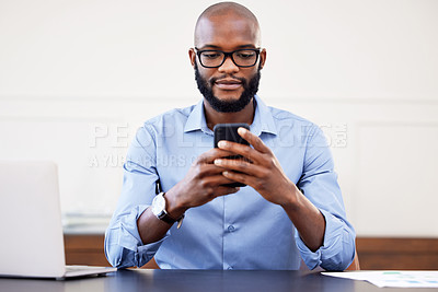Buy stock photo Black man, phone and desk in office with search on internet for networking, email or social media. Online research, digital marketing and businessman with glasses, cellphone and laptop at start up.