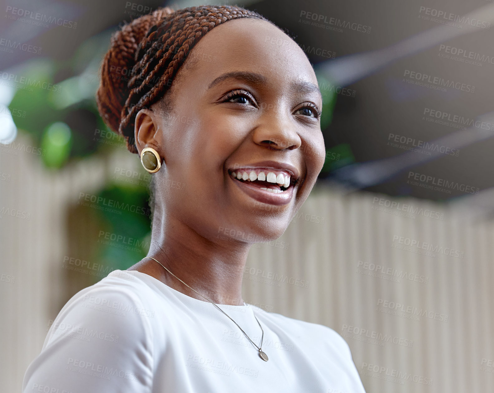 Buy stock photo Shot of a beautiful young woman talking to her colleagues outside