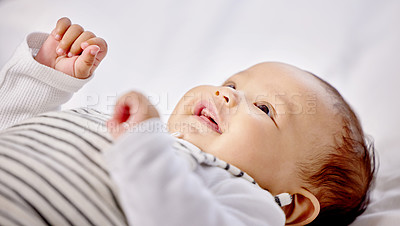 Buy stock photo Shot of a little baby playing by itself