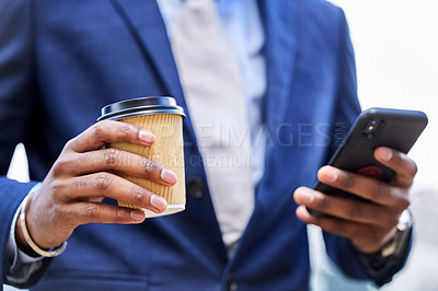 Buy stock photo Shot of a unrecognizable business man using his cellphone outside