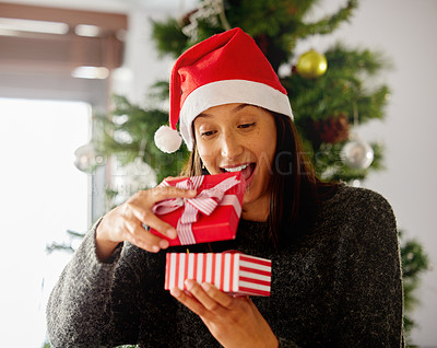 Buy stock photo Happy, woman and christmas present with box for seasonal holidays at home with festive tree. Excited, female person and gift, package or parcel for winter vacation celebration and wow for xmas