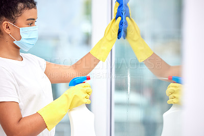 Buy stock photo Girl, spray and cleaning window with detergent in lounge for safety or protection from disease or dirt. Female person, maintenance and disinfect glass for health or wellness from virus or bacteria
