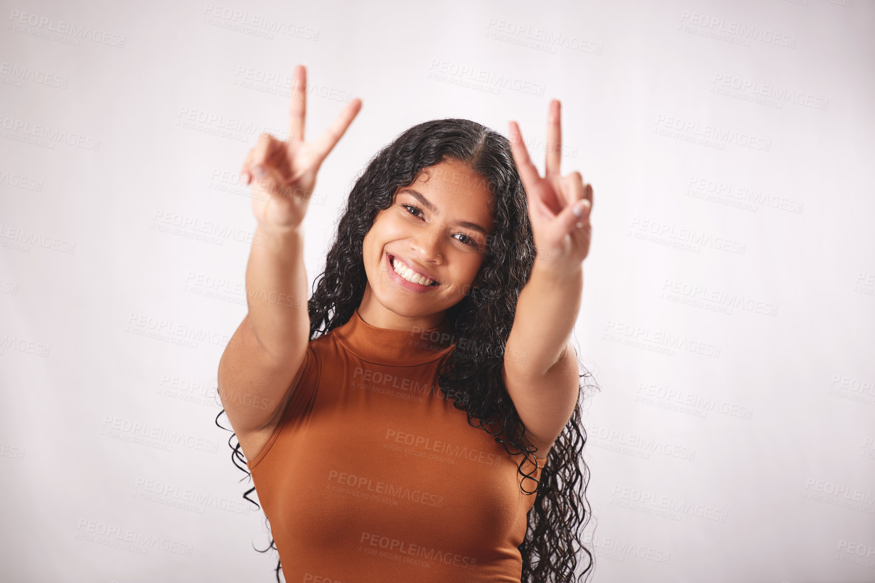 Buy stock photo Peace sign, happy and portrait of woman in studio for confidence, pride and fashion style. Emoji, smile and isolated person with hand gesture for positive attitude, joy and love on white background