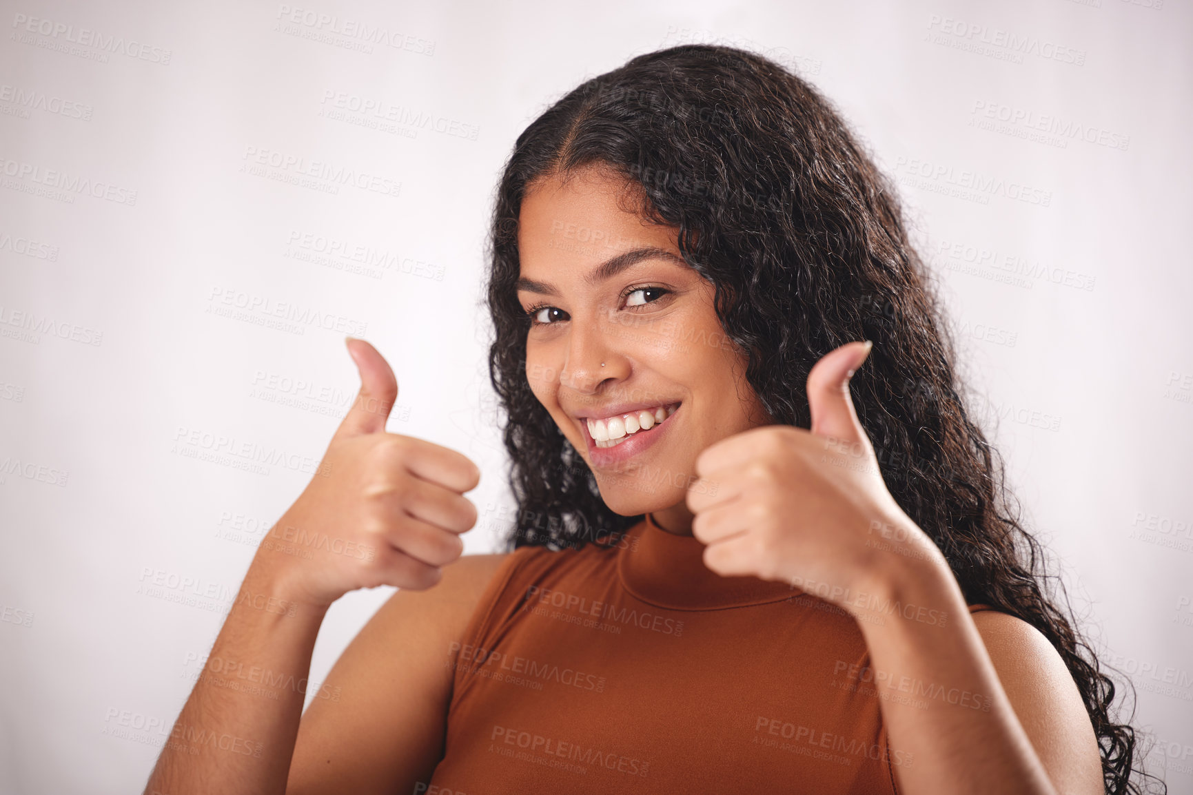 Buy stock photo Shot of a beautiful young woman posing in the studio