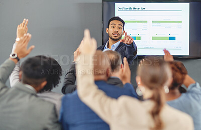 Buy stock photo Presentation, question and man with  business people in meeting, discussion and workshop with finance chart. Corporate, teamwork and speaker with audience for feedback, asking and answer in office