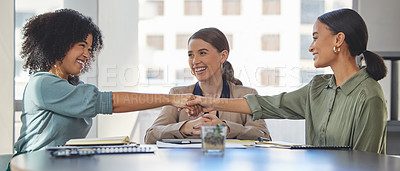 Buy stock photo Shot of a group of businesspeople having a meeting and shaking hands in a modern office