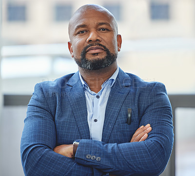 Buy stock photo Confidence, crossed arms and portrait of a businessman in his office with a serious face expression. Career, professional and confident African male executive ceo posing in the modern workplace.
