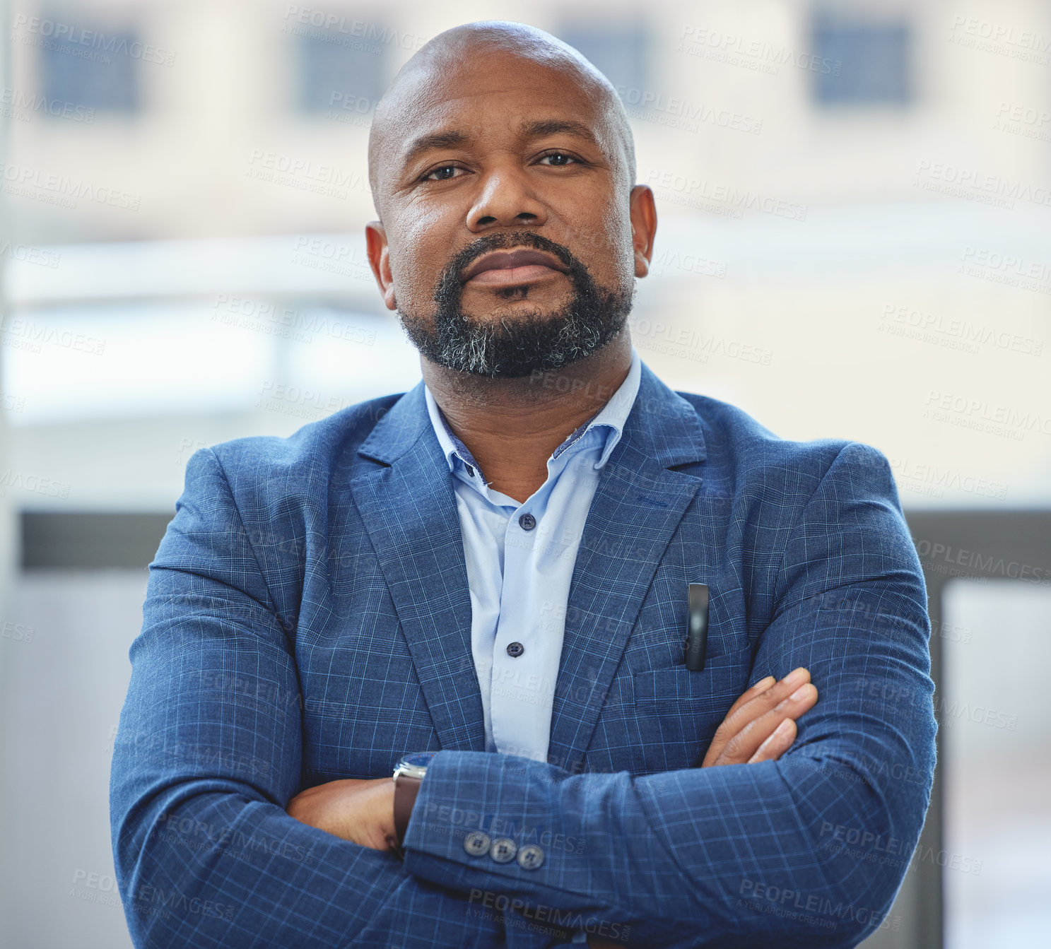 Buy stock photo Confidence, crossed arms and portrait of a businessman in his office with a serious face expression. Career, professional and confident African male executive ceo posing in the modern workplace.