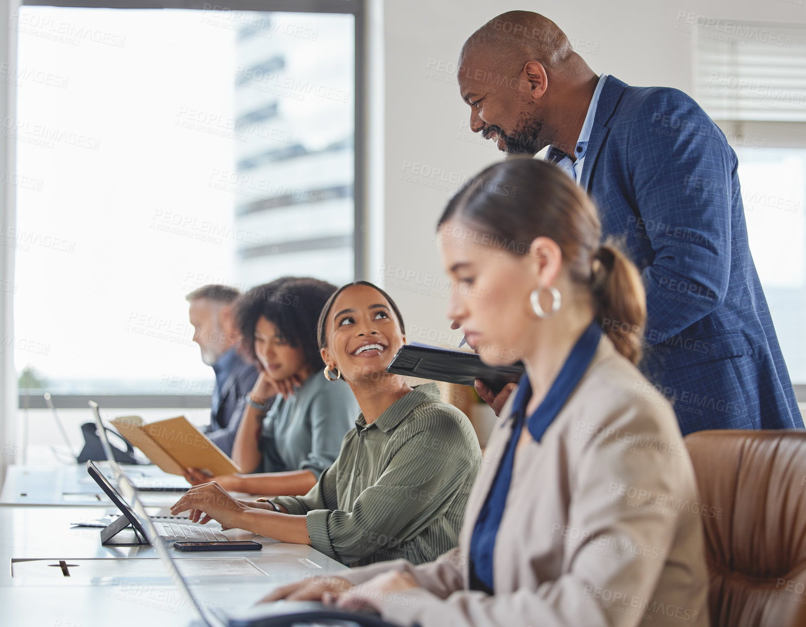 Buy stock photo Call center training, happy and people with a manager for telemarketing support and advice. Contact us, check and a black man speaking to a customer care employee about consulting and service