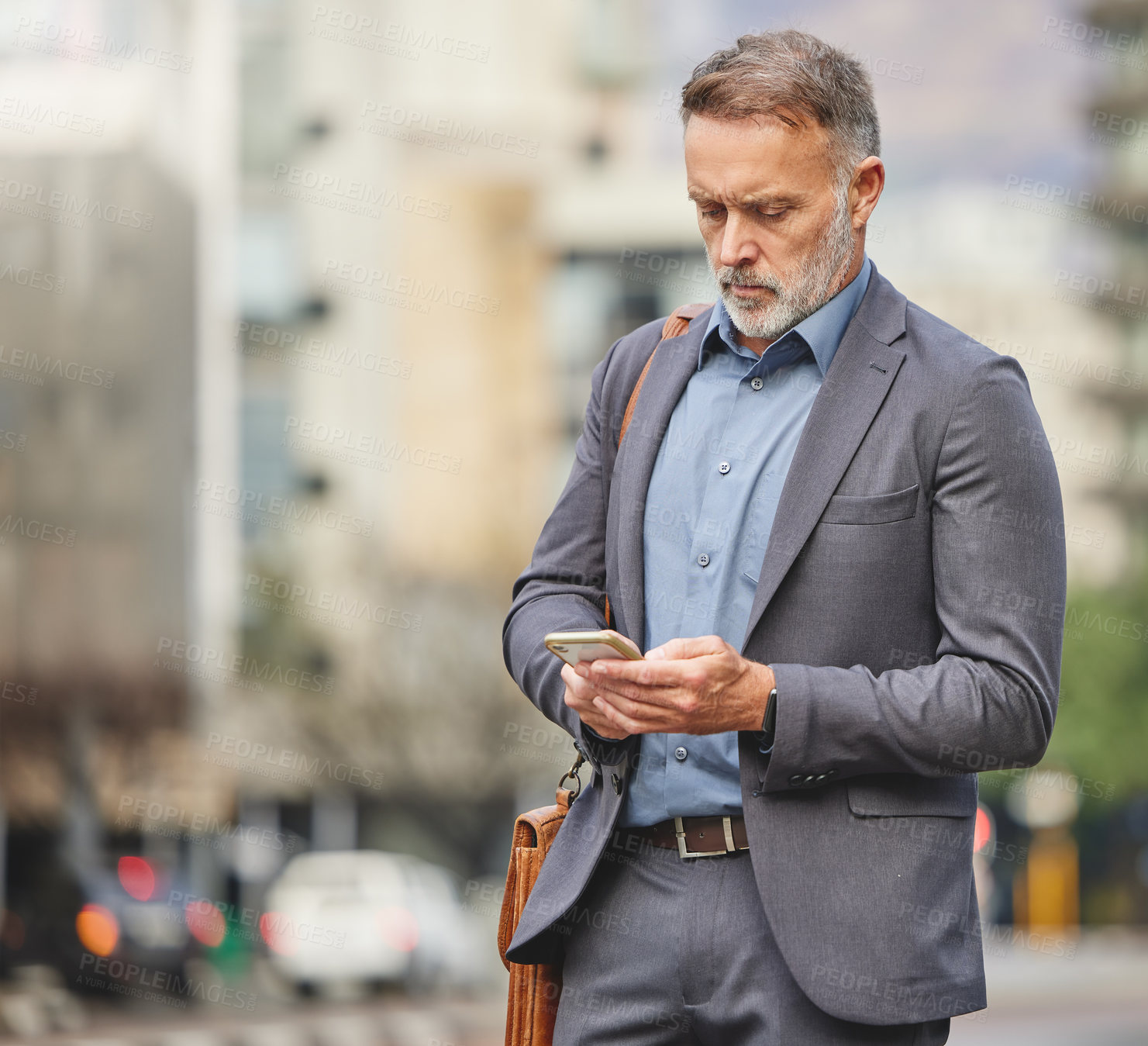 Buy stock photo Walking, city and mature businessman with phone for morning commute, travel and journey to work. Professional, corporate and person on smartphone for networking, website and online chat in town