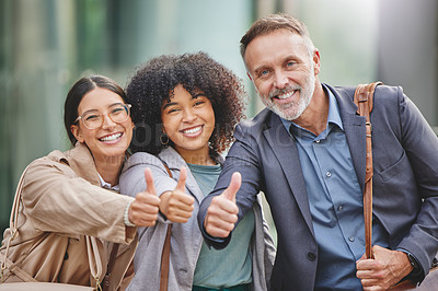 Buy stock photo Shot of a group of business people giving the thumbs up