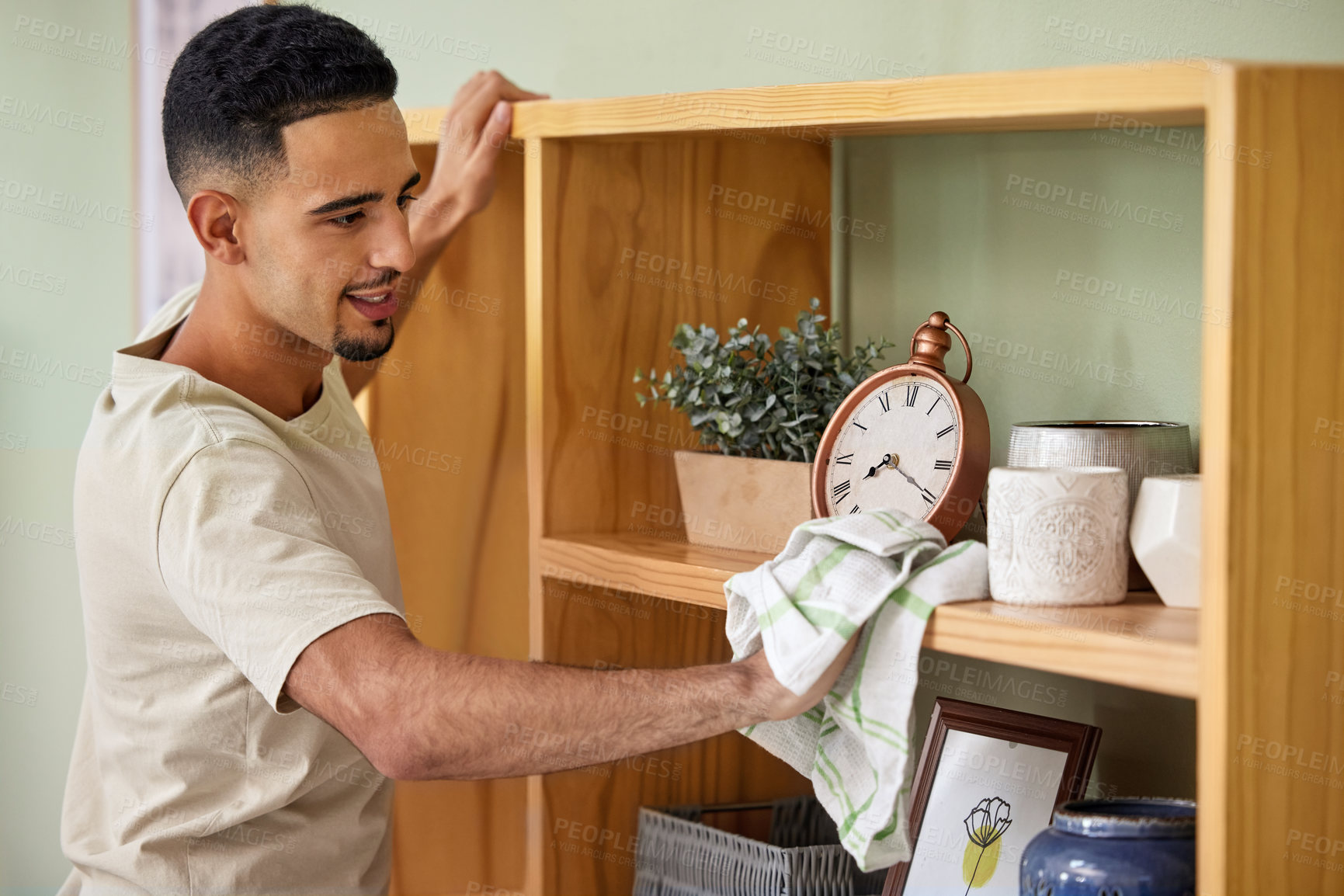 Buy stock photo Cleaning, shelf and man in home to wipe with spray for chores, housework or responsibility. Bacteria, cloth, and disinfectant with person scrubbing surface in apartment for control or hygiene